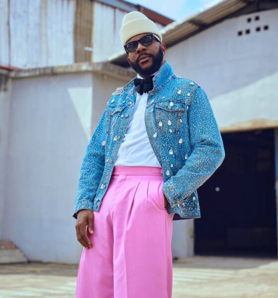 Big Brother Naija host Ebuka Obi-Uchendu wearing a crystal-embellished denim jacket and pink wide-leg trousers by ATAFO, inspired by legendary actor Nkem Owoh, as BBNaija Season 11 premieres.FO as BBNaija Season 11 premieres.