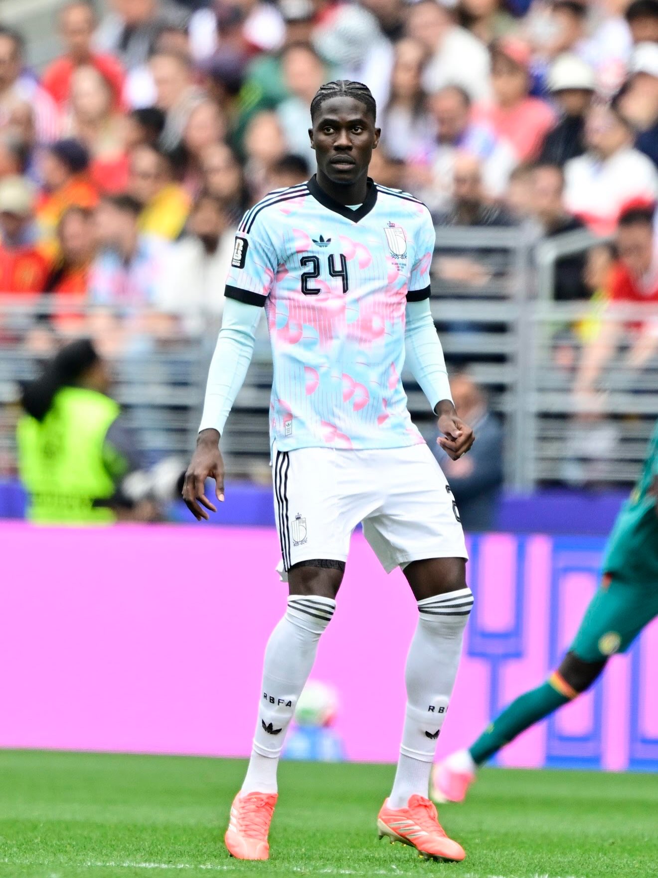 Amadou Onana of Senegalese and Cameroonian heritage playing in midfield for Belgium during their 4-1 Round of 16 victory over the USA at the 2026 FIFA World Cup.
