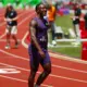 Nigerian track and field athlete Kanyinsola Ajayi walking on the athletics track after his race victory.