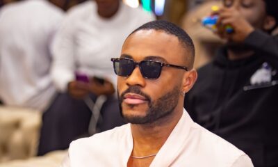 Big Brother Naija Season 10 ("No Loose Guard") finalist Kola Omotosho looking stylish in a pale pink silk shirt and sunglasses at the Big Brother Naija Season 11 press conference in Lagos, Nigeria.