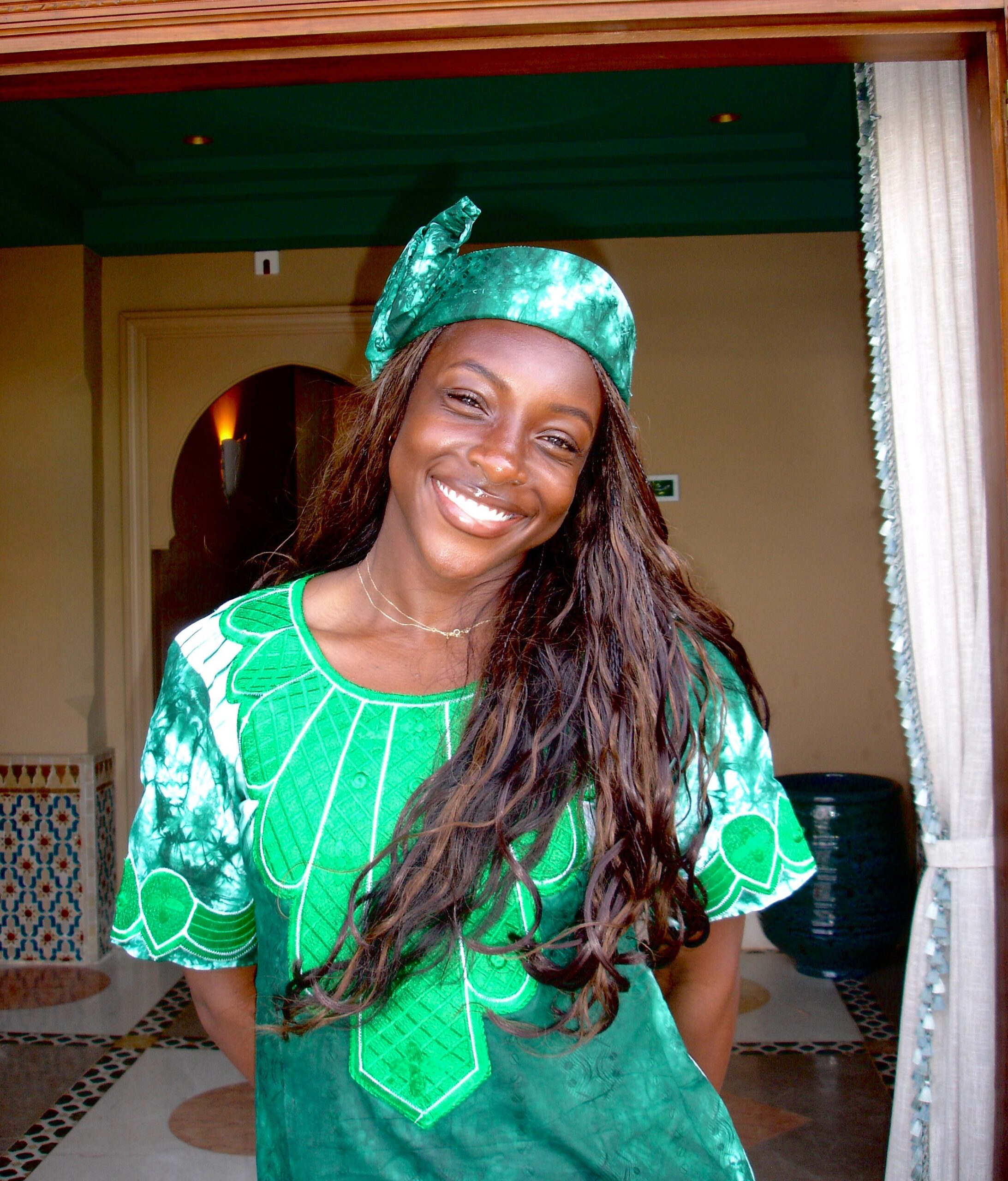 Michelle Alozie wearing green and white traditional Nigerian attire ahead of Super Falcons WAFCON 2026 campaign.