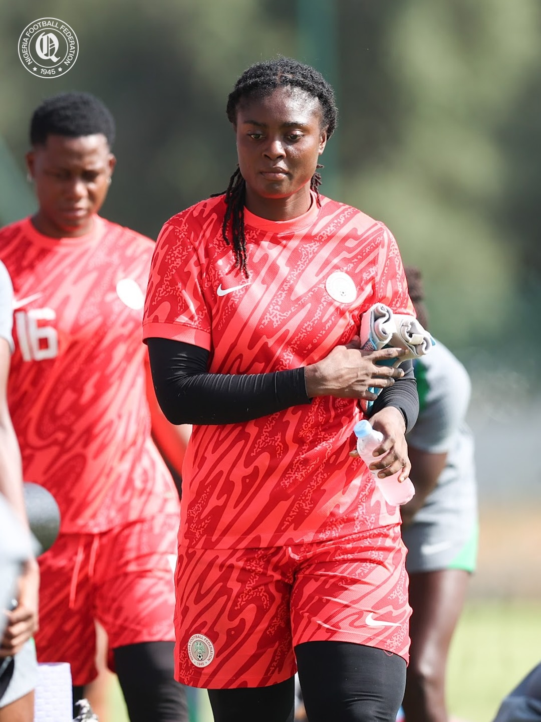 Fatima Oloko of the Nigeria Super Falcons holds her goalkeeper gloves during a training session ahead of the WAFCON 2026 opener against Malawi.