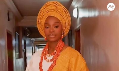 Folake Olowofoyeku wearing a white traditional outfit, gold gele, and coral beads following her chieftaincy conferment as Yeye Oba and Yeye Atayese in Ilesa, Osun State.