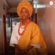 Folake Olowofoyeku wearing a white traditional outfit, gold gele, and coral beads following her chieftaincy conferment as Yeye Oba and Yeye Atayese in Ilesa, Osun State.