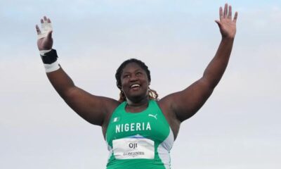 Nigerian shot putter Jessica Oji raising her arms in celebration after securing silver in the women's shot put final at the Glasgow 2026 Commonwealth Games.