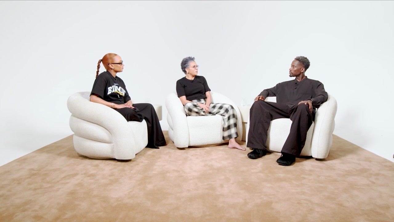 Nana Otedola sitting between Temi Ajibade and Mr Eazi on white armchairs during the Season 5 finale of The How Far Podcast.