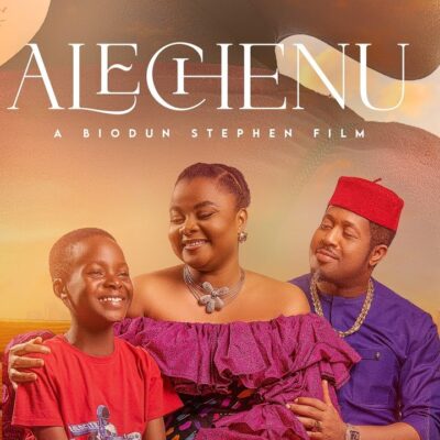Official movie poster of Alechenu, a Biodun Stephen film, featuring Bimbo Ademoye in a purple off-the-shoulder dress alongside Mike Ezuruonye wearing a red cap and purple traditional outfit, with child actor Royal Aziomaku in a red t-shirt against a warm sunset backdrop.
