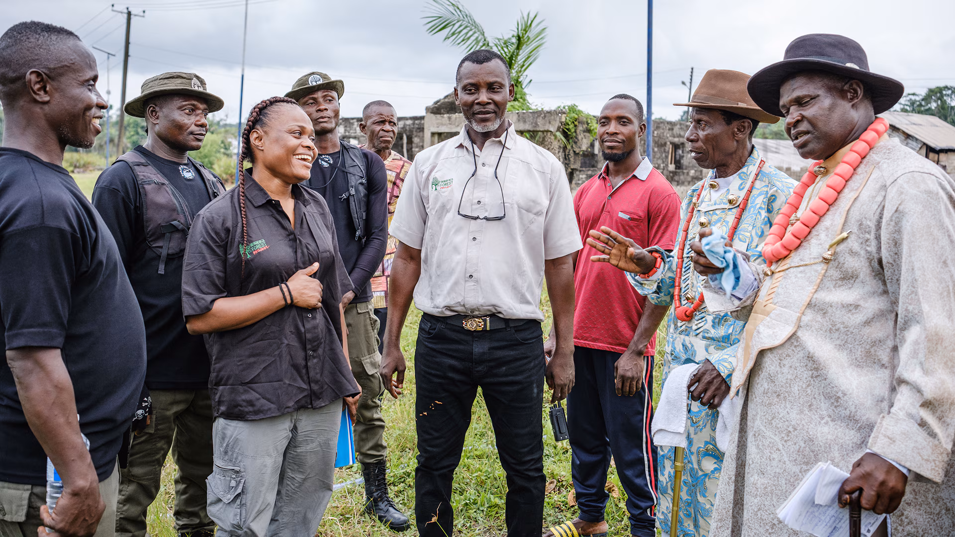 Nigerian conservationist Rachel Ikemeh with her SWNDFP team members and traditional chiefs of the Apoi community in the Niger Delta.