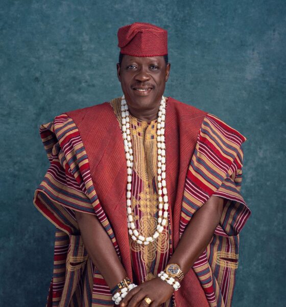 Memorial photo of Nollywood actor Taiwo Hassan Ogogo wearing traditional red Aso-Oke Agbada and white coral beads.