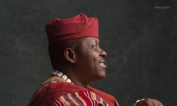 Profile view of pioneer Nollywood actor Taiwo Hassan Ogogo in traditional Aso-Oke Agbada.