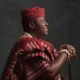 Profile view of pioneer Nollywood actor Taiwo Hassan Ogogo in traditional Aso-Oke Agbada.