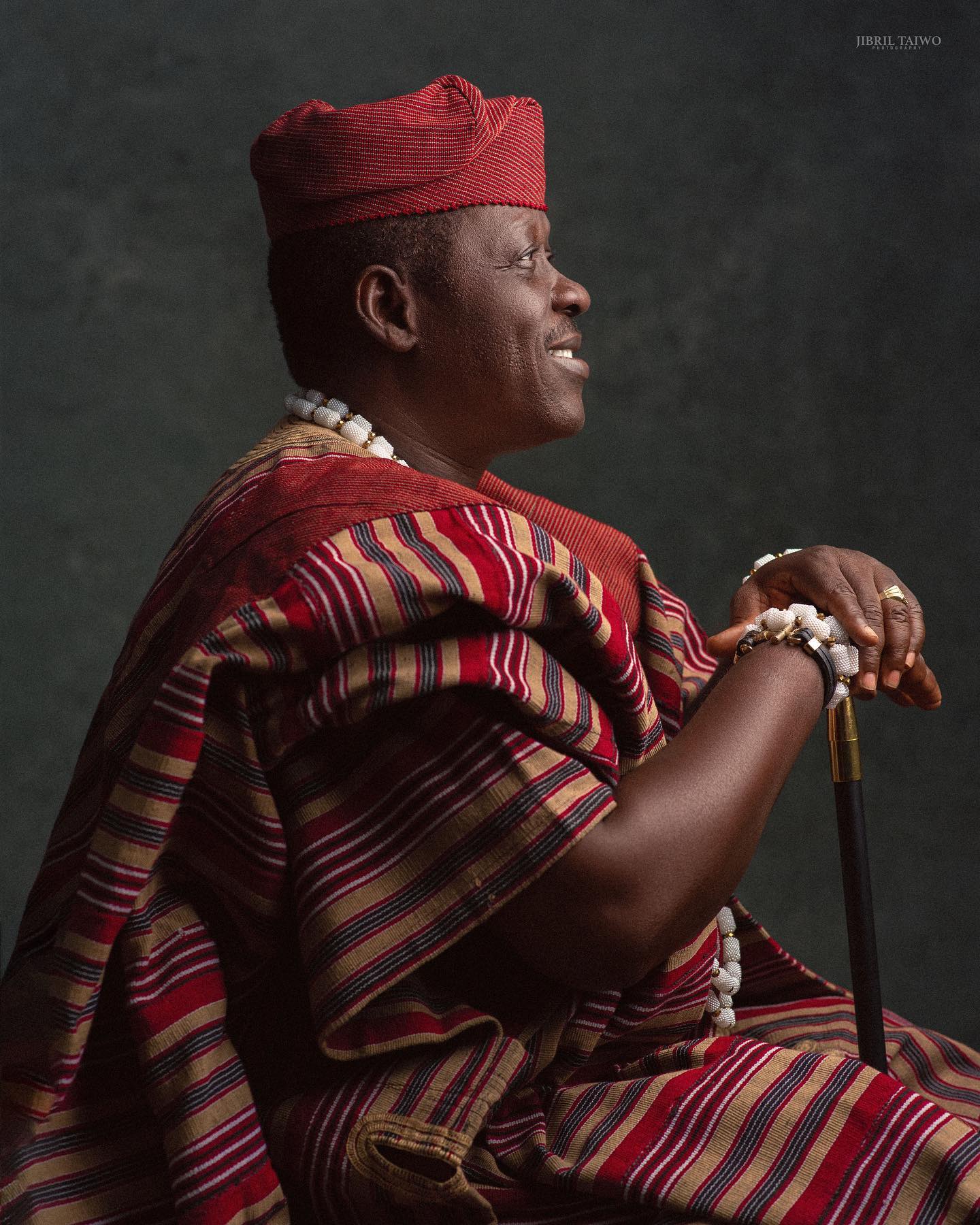 Profile view of pioneer Nollywood actor Taiwo Hassan Ogogo in traditional Aso-Oke Agbada.