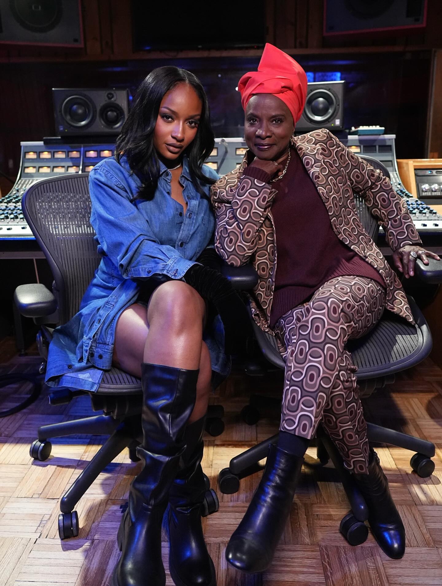 Angélique Kidjo sitting alongside Nigerian singer Ayra Starr in a recording studio during the production of their joint single Aye Kan.