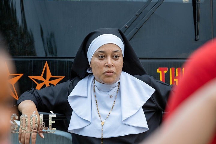 Adunni Ade dressed as a nun on set for her executive produced film Soóle.