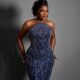 Medium portrait of Funke Akindele in a navy blue beaded corset gown.