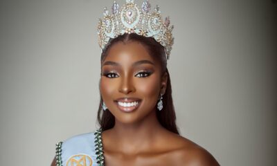 Tamunosoye Karibi-George smiling wearing a jewelled crown, a heavily embellished silver gown, and the Miss World Nigeria sash.