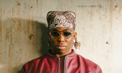 Fola wearing a bandana, sunglasses, and red leather jacket following his 10 nominations at the 2026 Headies Awards.