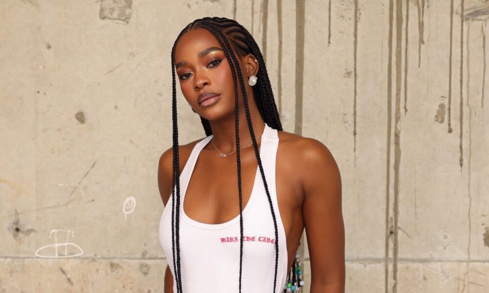 Dede Ashiogwu Shows How to Style Cornrow Braids With a White Halterneck Mini Dress