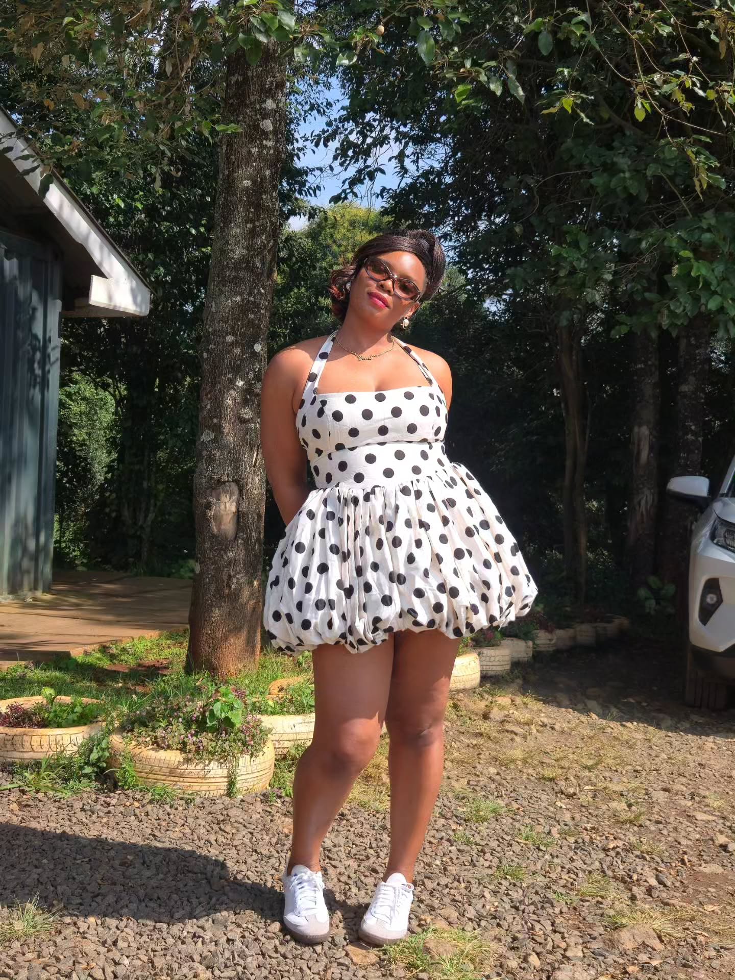 Yemi Alade Shows How to Style a Polka Dot Mini Dress & Trainers for Daytime