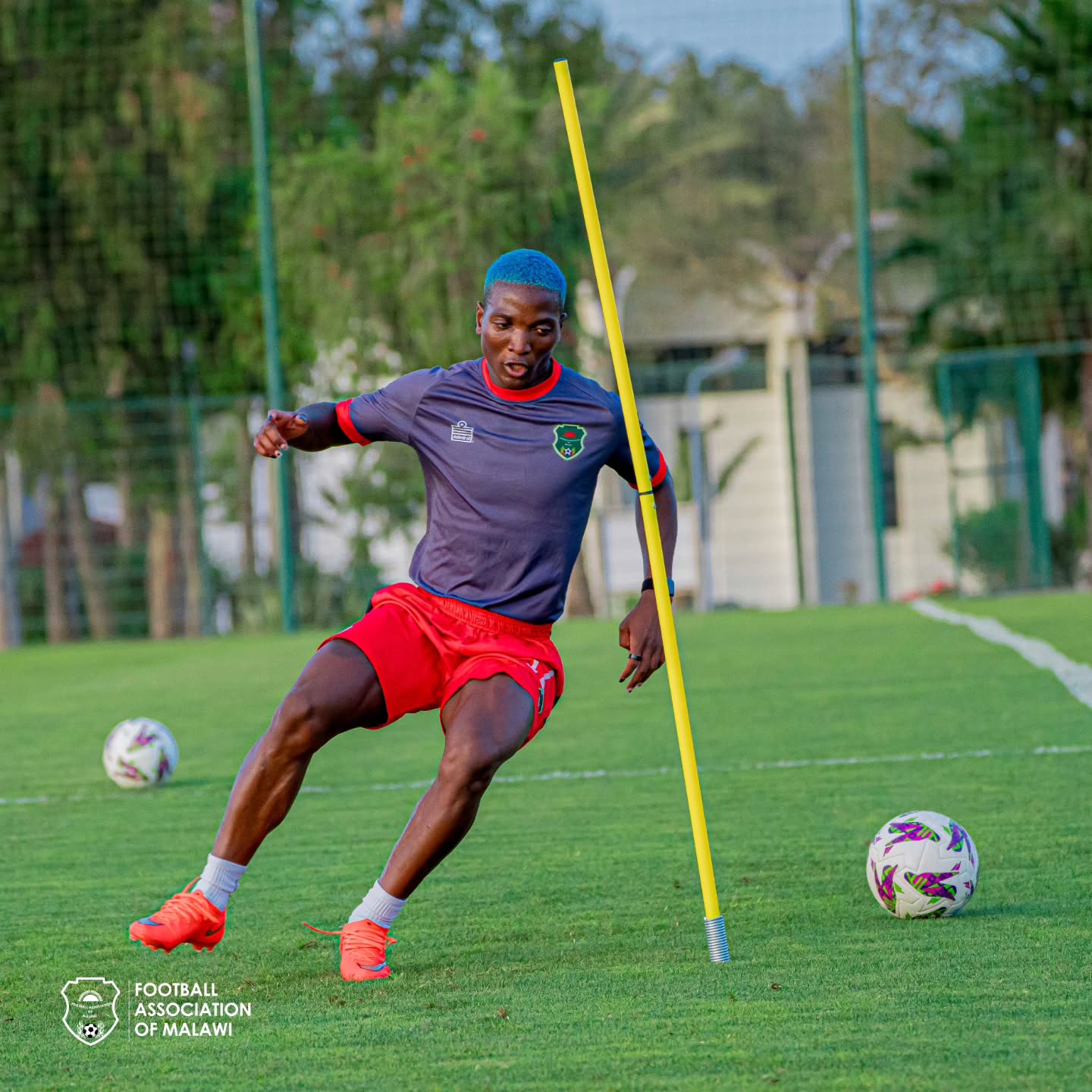 Temwa Chawinga running through agility training cones during a Malawi national team practice session.