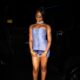 Ayra Starr wearing a strapless periwinkle ruched mini dress with floral appliqué and a thick rhinestone choker in New York.