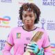 Michaely Bihina holding her TotalEnergies Woman of the Match award after Cameroon defeated Nigeria 1-0 in the WAFCON quarter-finals.