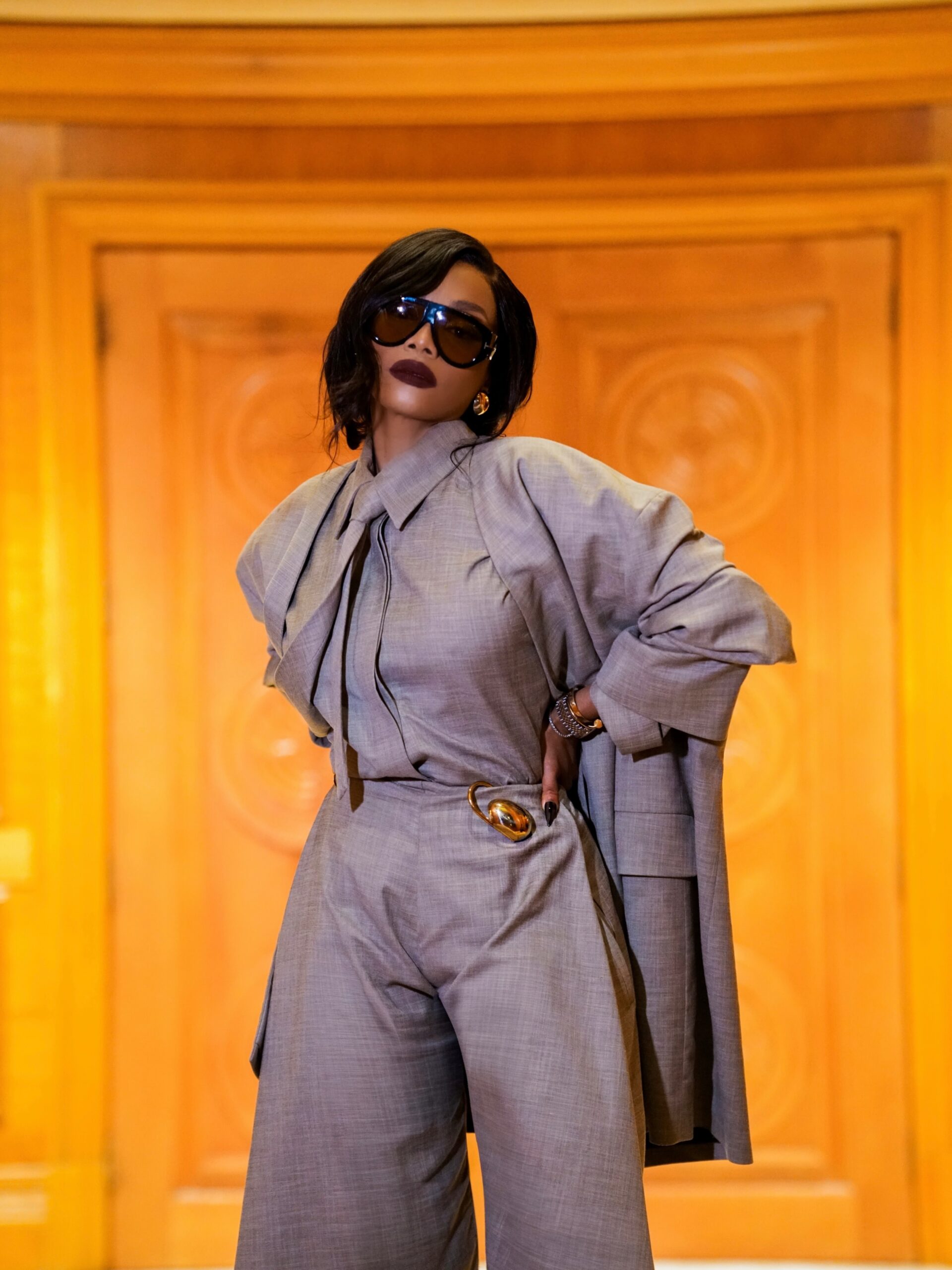 Bonang Matheba wearing dark sunglasses and burgundy lipstick at SAMAs