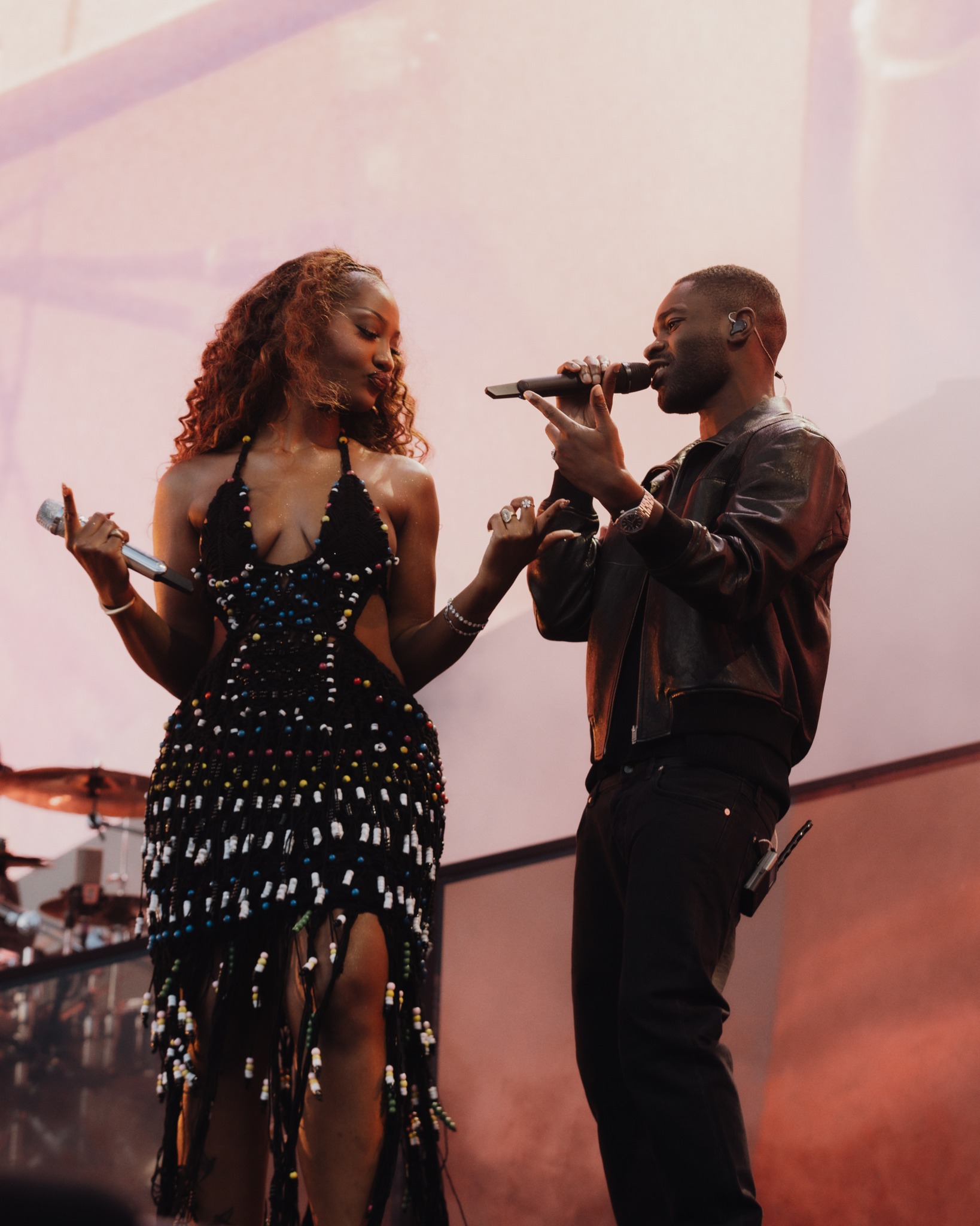 Tems performing live on stage with UK rapper Dave at All Points East festival in London.