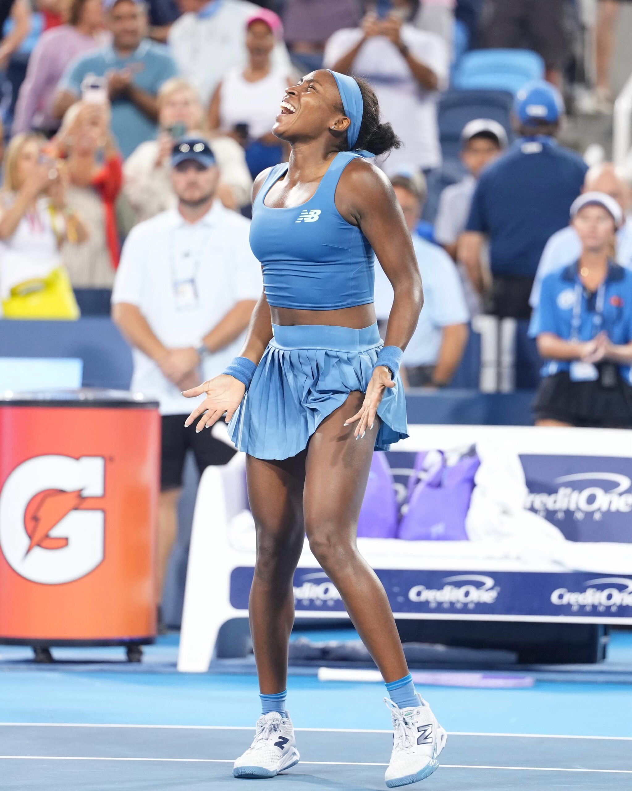 Coco Gauff shouting in jubilation after winning match point at the Cincinnati Open
