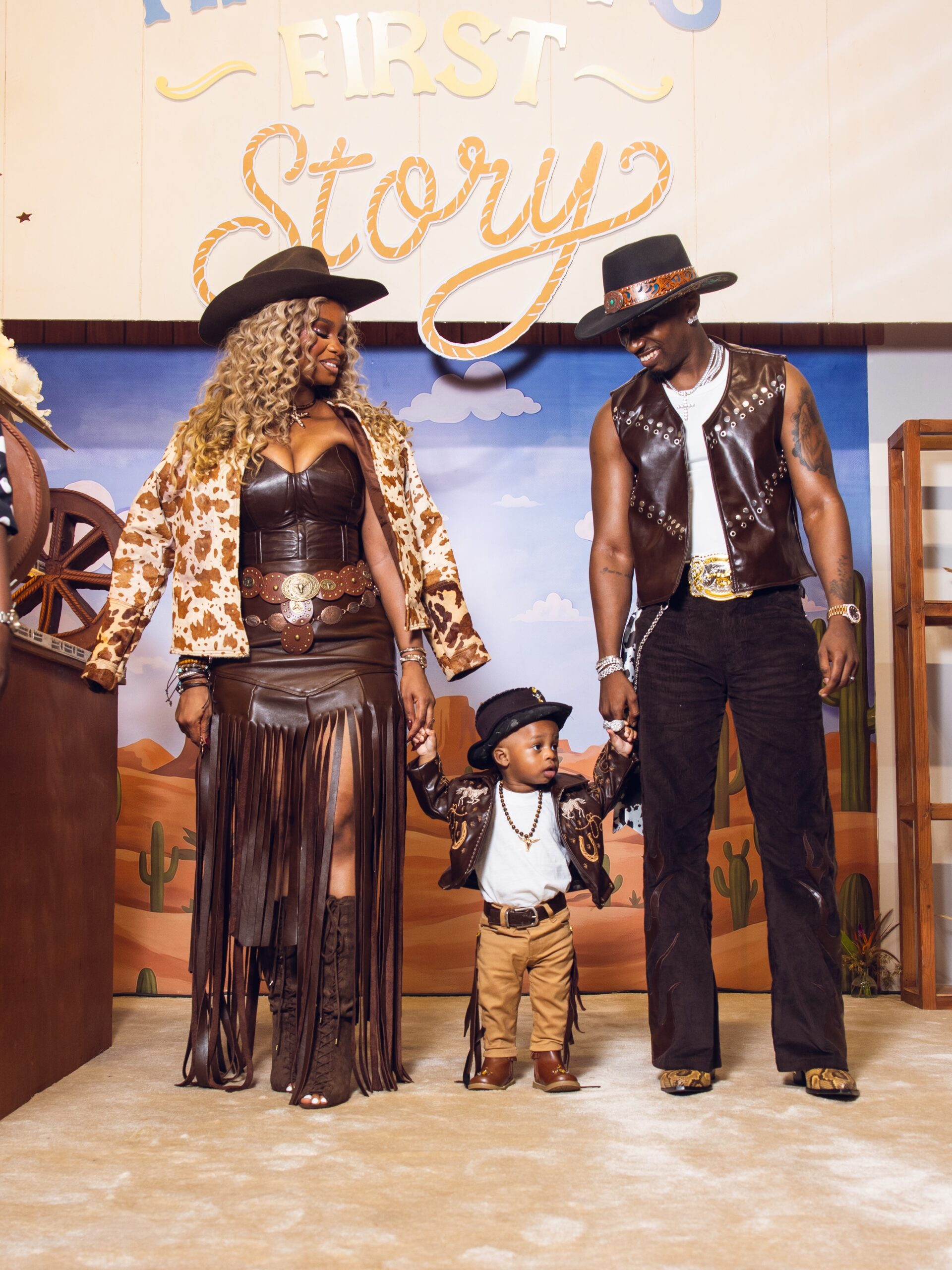 Priscilla Ojo and Juma Jux holding hands with son Rakeem in matching leather cowboy outfits at birthday venue