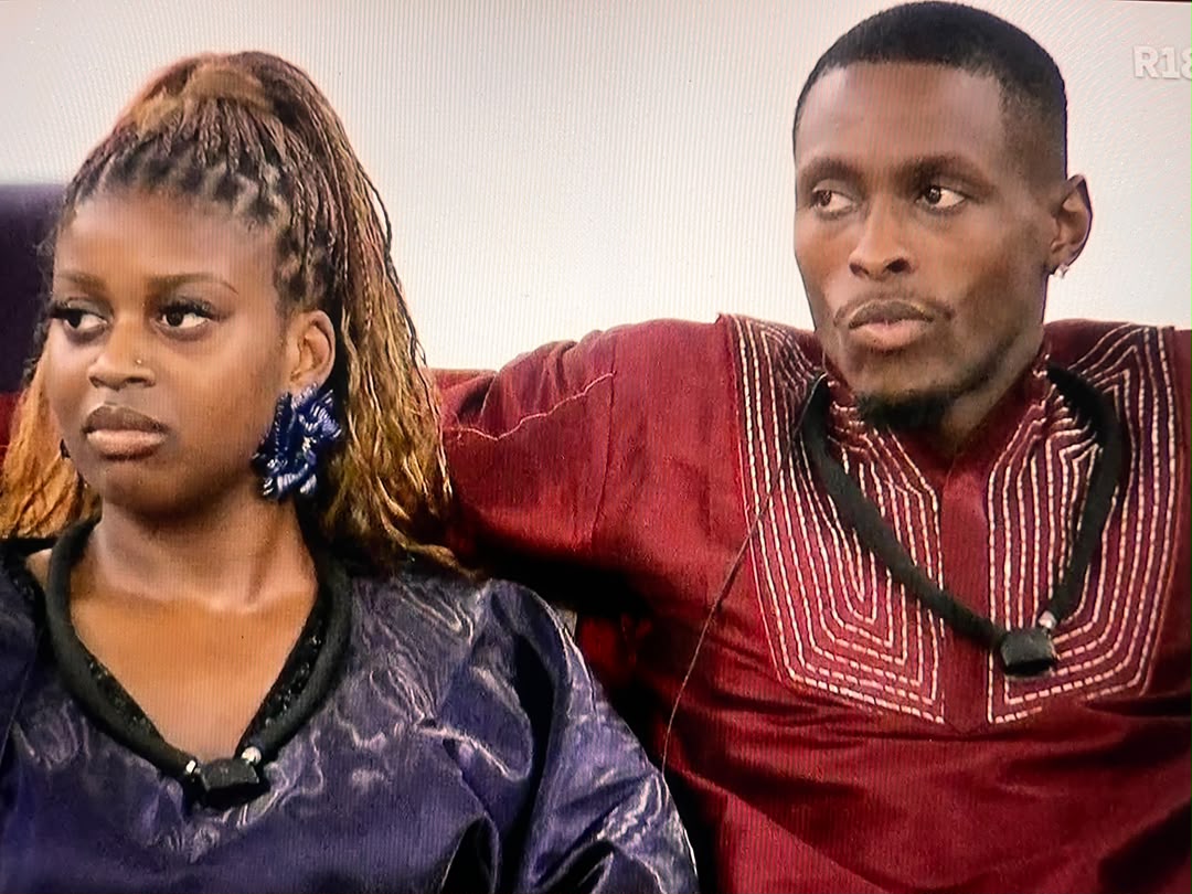 BBNaija Season 11 housemates Araga and Temi Nkem sitting together on the couch during the eviction show.