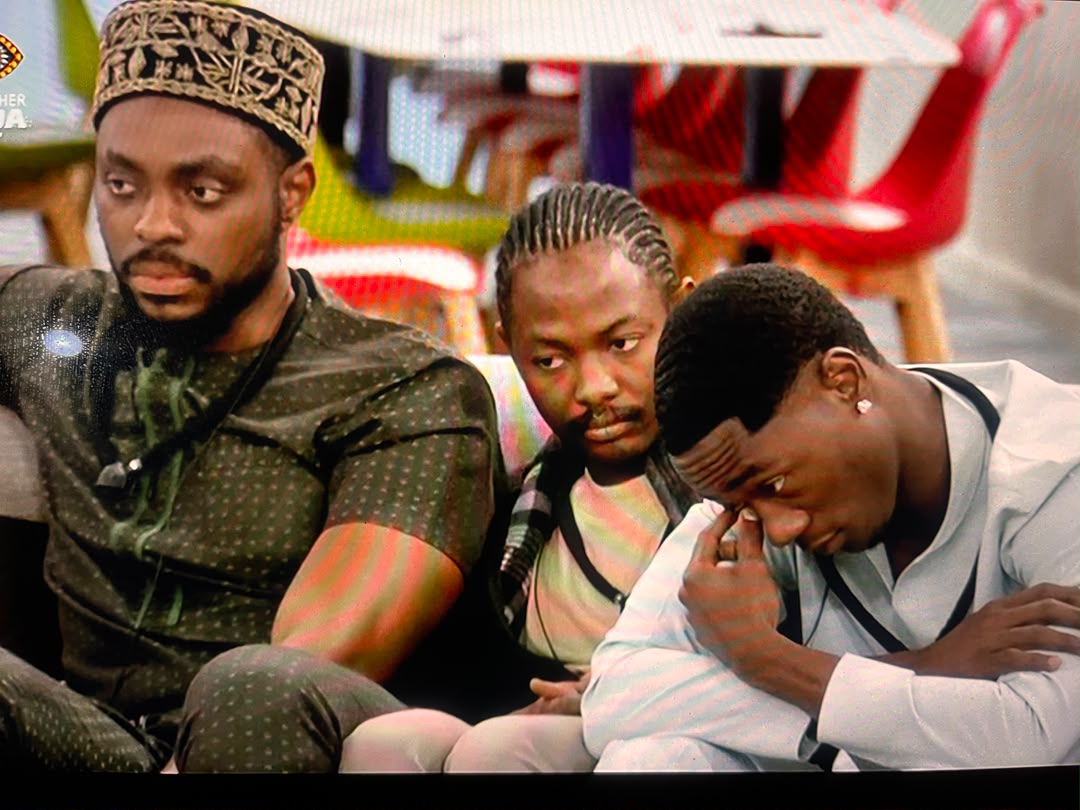 BBNaija Season 11 housemates Aikou and Tram seated in the lounge during the Sunday live eviction show.