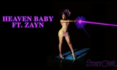 Ayra Starr wearing a pink mini dress and metallic purple Gele headpiece with pink laser light text reading Heaven Baby Ft ZAYN.