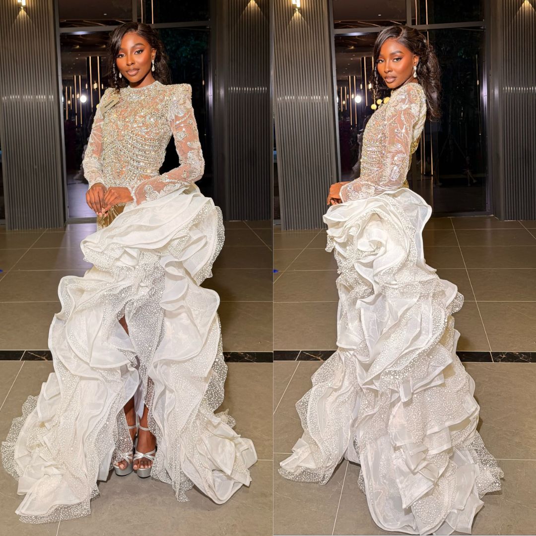 Tamunosoye Karibi-George wearing a long-sleeved silver beaded high-neck top with cascading white tulle ruffles at Miss World 2026 Opening Ceremony