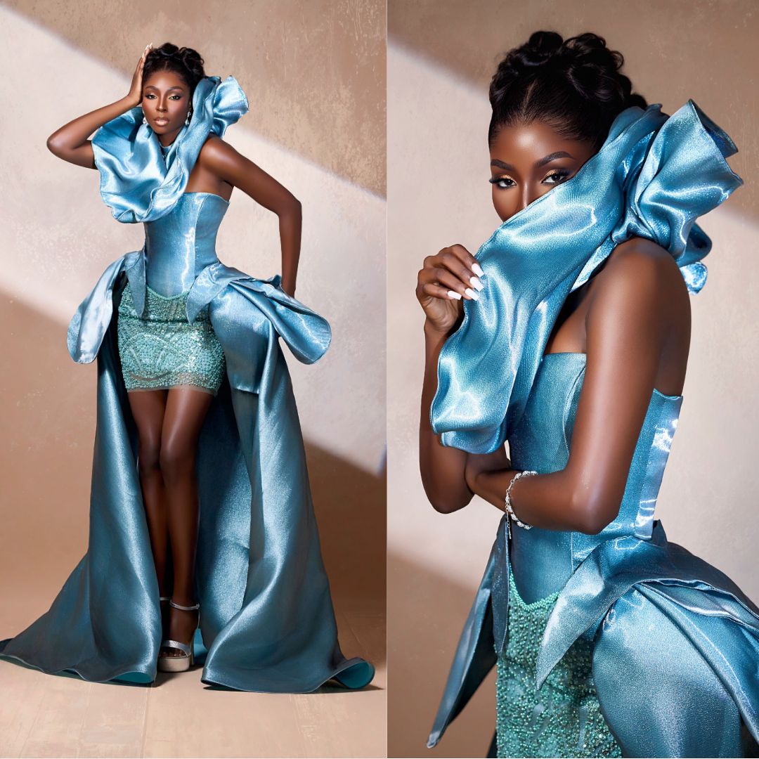 Tamunosoye Karibi-George in an ice-blue asymmetrical shoulder high-low overskirt and green beaded micro-mini skirt for Miss World 2026