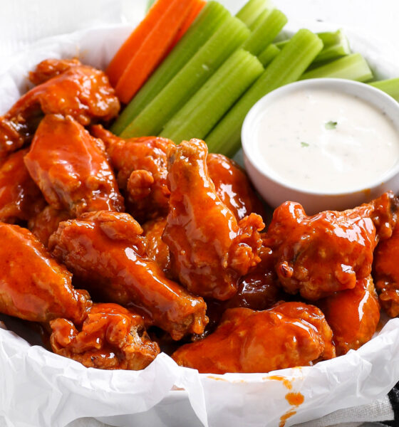 Crispy buffalo chicken wings tossed in hot sauce served with ranch dip, celery sticks, and sliced carrots.