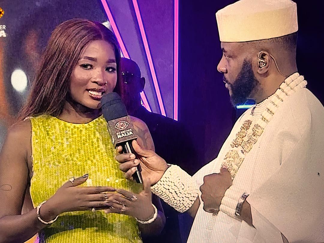 Evicted housemate Goddessa speaking to show host Ebuka Obi-Uchendu during the Big Brother Naija Season 11 live eviction show.