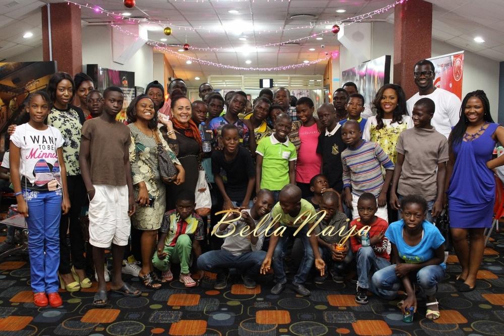 BellaNaija team, Tripican representatives, and Child Life-Line beneficiaries at cinema during 2014 Christmas outreach.