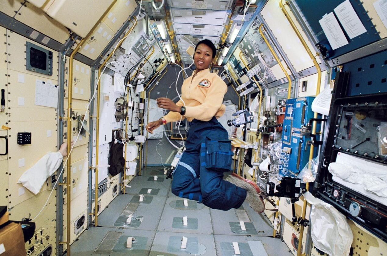 Dr Mae Jemison floating in weightlessness inside the Spacelab module on Space Shuttle Endeavour