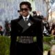 Virgil Abloh Award winner Wisdom Kaye in custom upcycled Public School metallic corset suit at Met Gala 2026.