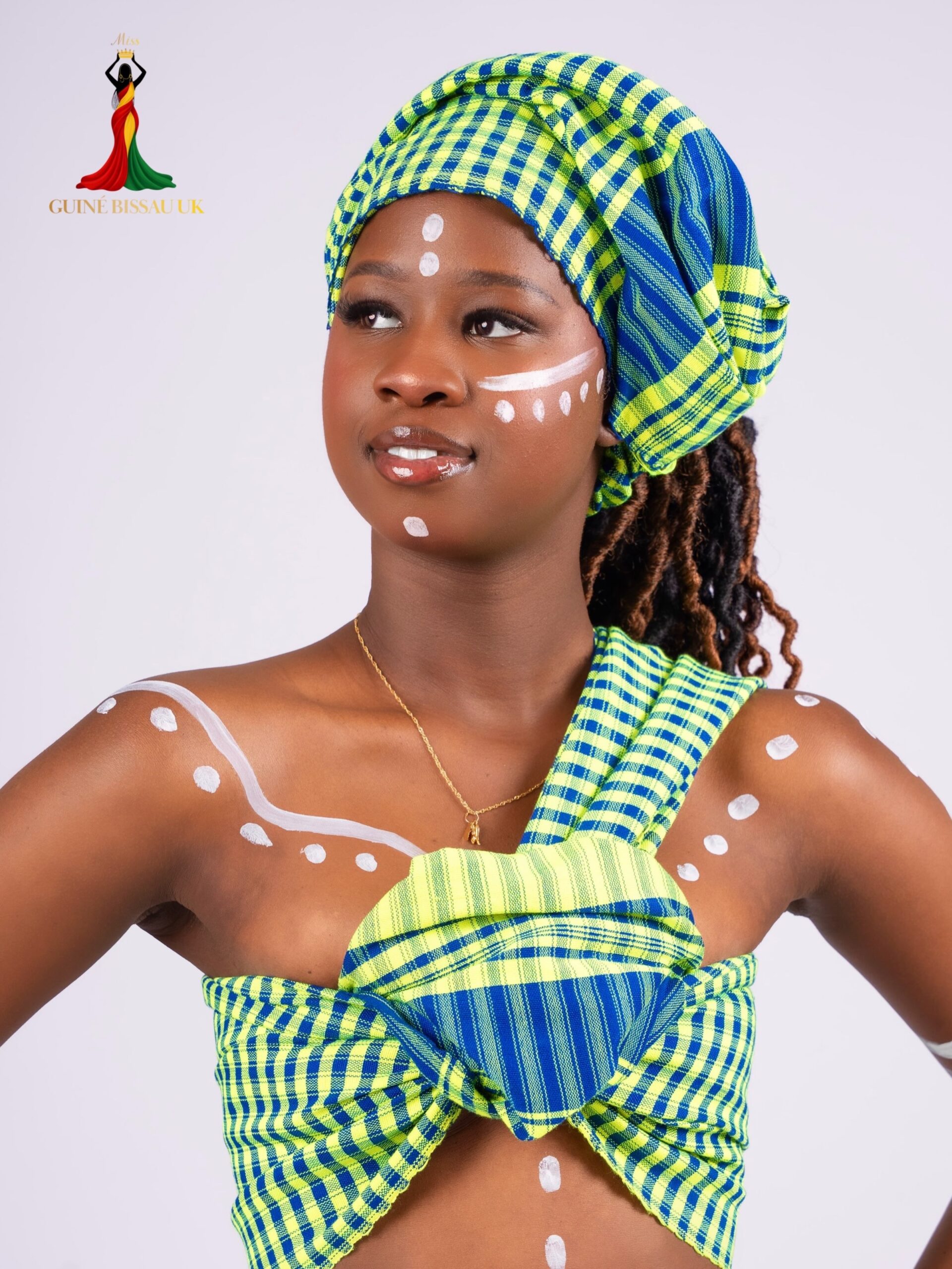 Waldira Da Silva wearing a green and blue check headwrap for Miss Guiné-Bissau UK 2026