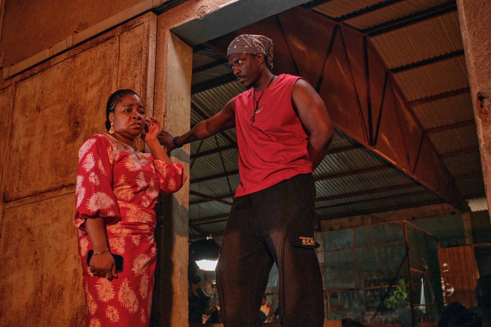 Linda Ejiofor-Suleiman and Shamz Garuba filming a scene for the crime thriller Black Market