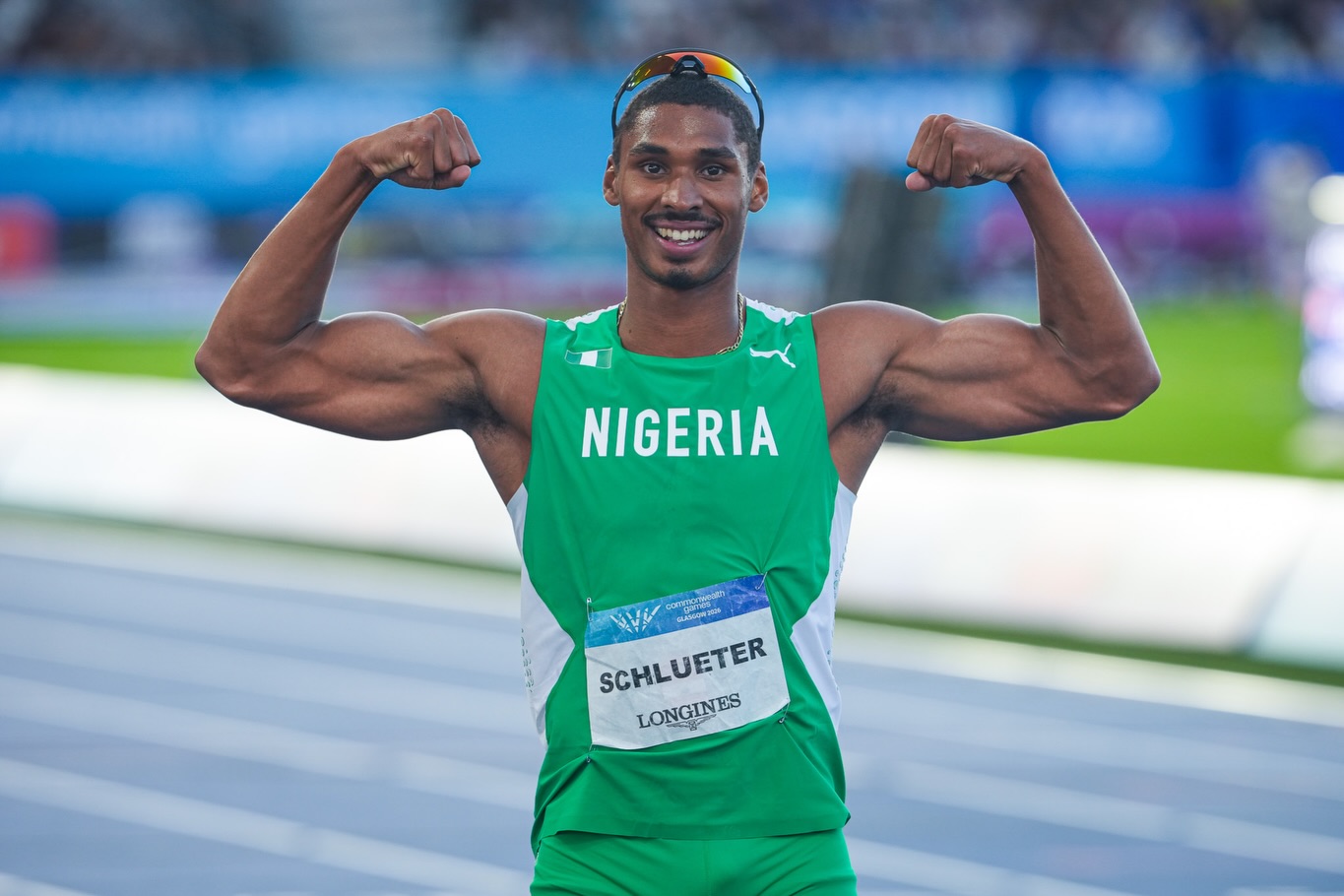 Jami Schlueter wearing a Nigeria national team singlet with bib number at an international athletics meet.