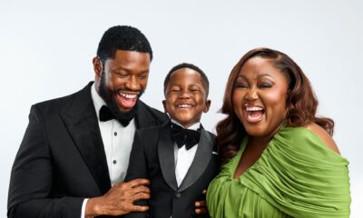 Blessing Obasi and Stan Nze laughing with their son Jayden in a 3rd birthday family photo shoot.