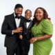 Blessing Obasi and Stan Nze laughing with their son Jayden in a 3rd birthday family photo shoot.