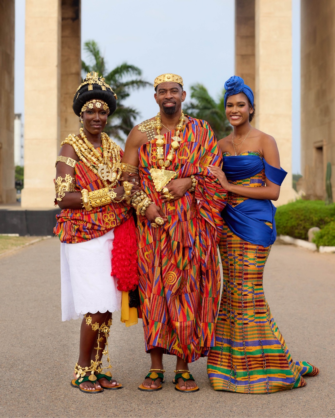 Bozoma Saint John, her husband Keely Watson, and her daughter Lael Saint John wearing hand-woven Ghanaian Kente cloth and gold royal jewellery for traditional wedding rites in Accra.