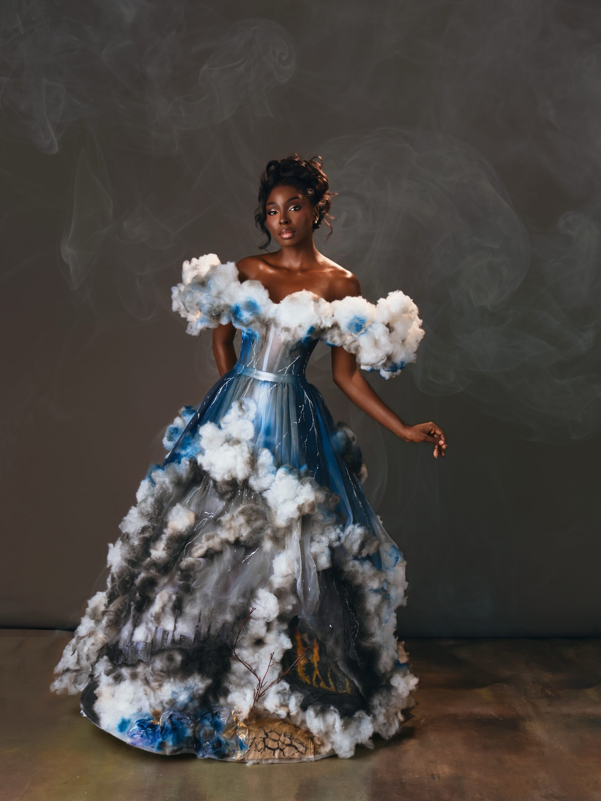 Top 12 finalist Tamunosoye Karibi-George in a blue cloud-textured climate awareness gown at Miss World 2026.