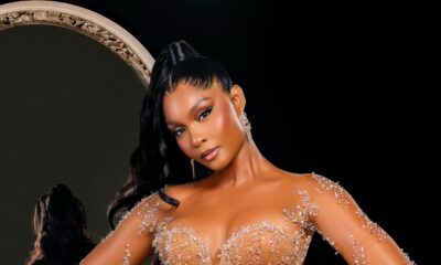 Osas Ighodaro wearing a custom sheer corseted Veekee James lace gown with crystal embellishments