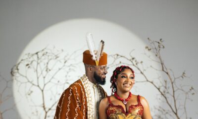 Akin Faminu and Kiky Festus smiling in traditional attire styled by The Style Infidel.