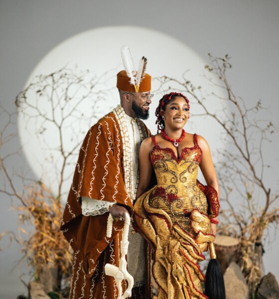 Akin Faminu and Kiky Festus smiling in traditional attire styled by The Style Infidel.